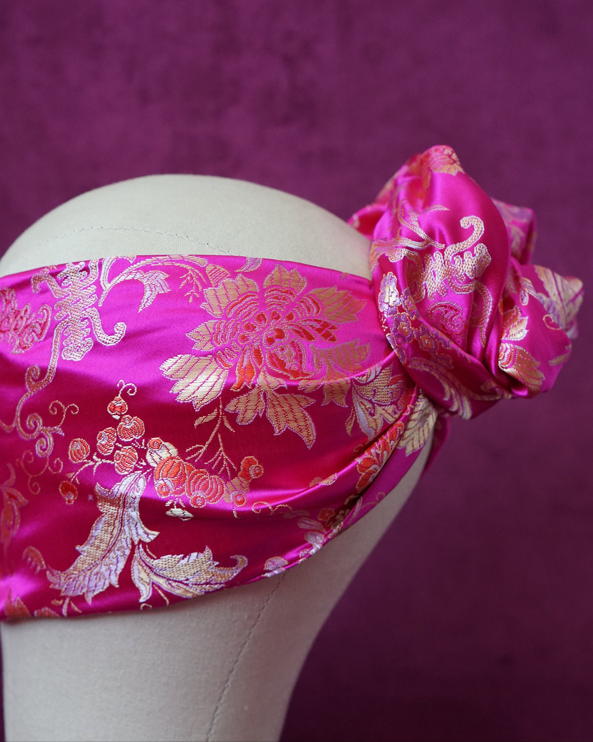Handmade wired turban headband in fuchsia and gold satin brocade woven with lush blooms