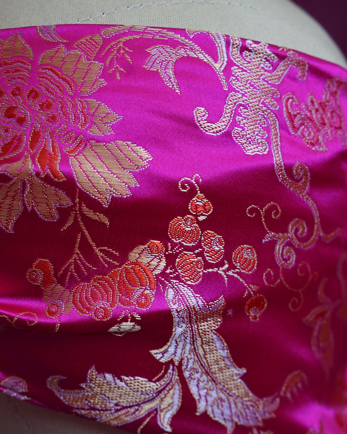 Handmade wired turban headband in fuchsia and gold satin brocade woven with lush blooms