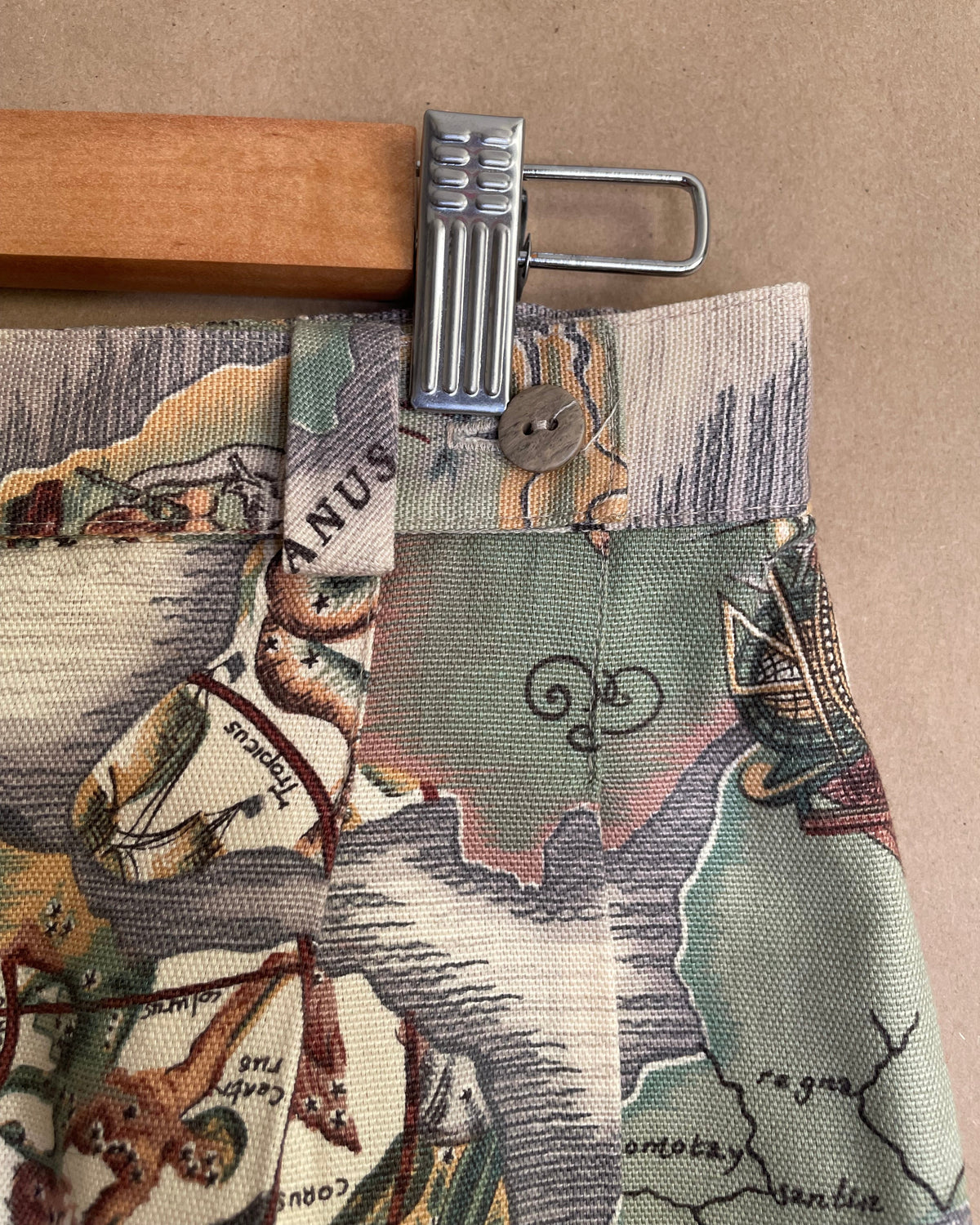 Interior view of the shorts showing the zipper and waistband construction