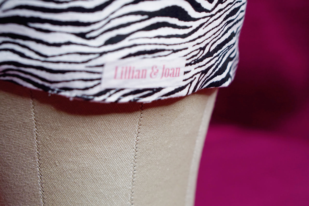 Zebra print wired turban headband by Lillian & Joan