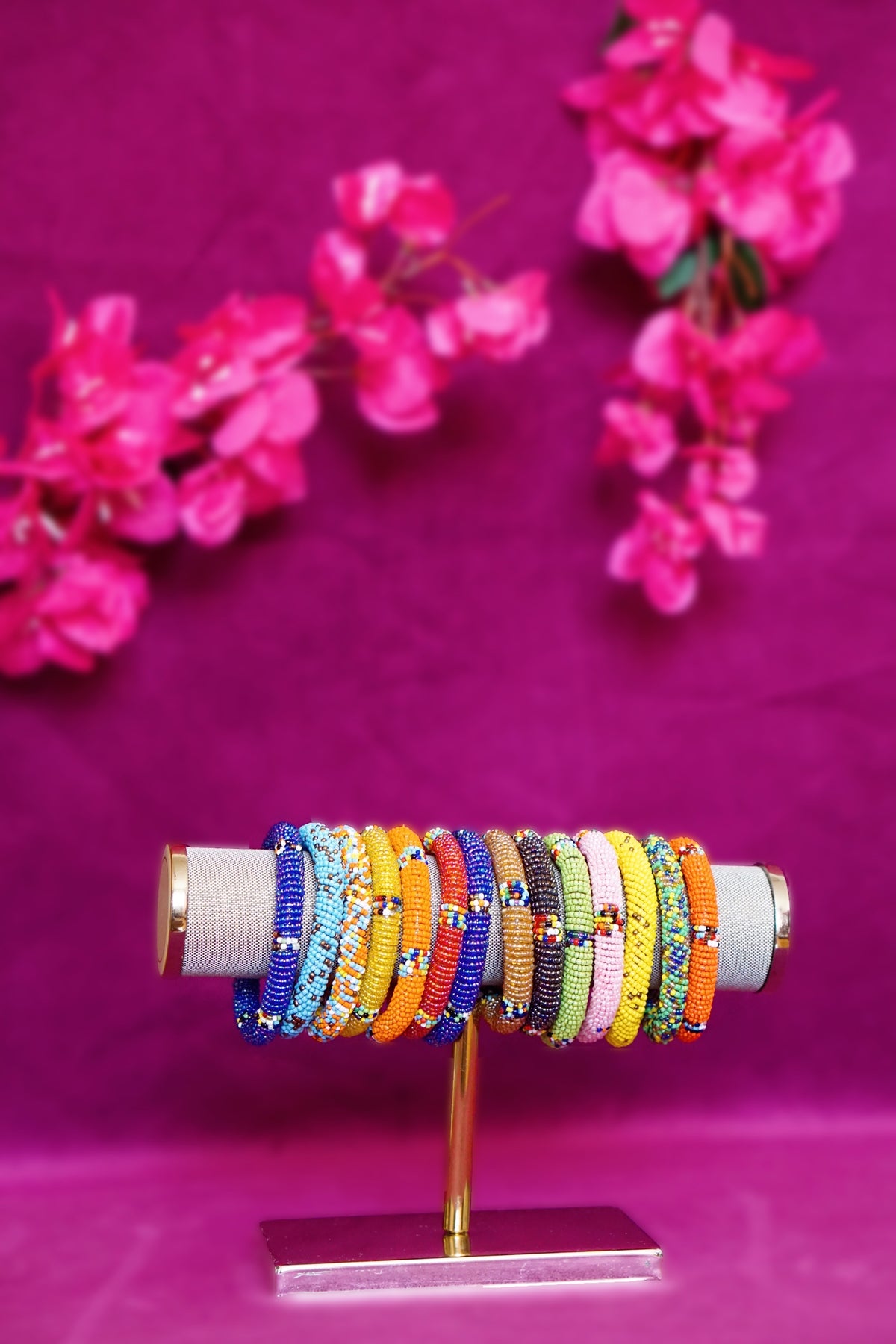 Collection of handmade colorful beaded maassai bracelets from Kenya