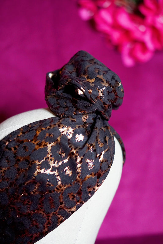 Metallic leopard print wired turban headband by Lillian & Joan