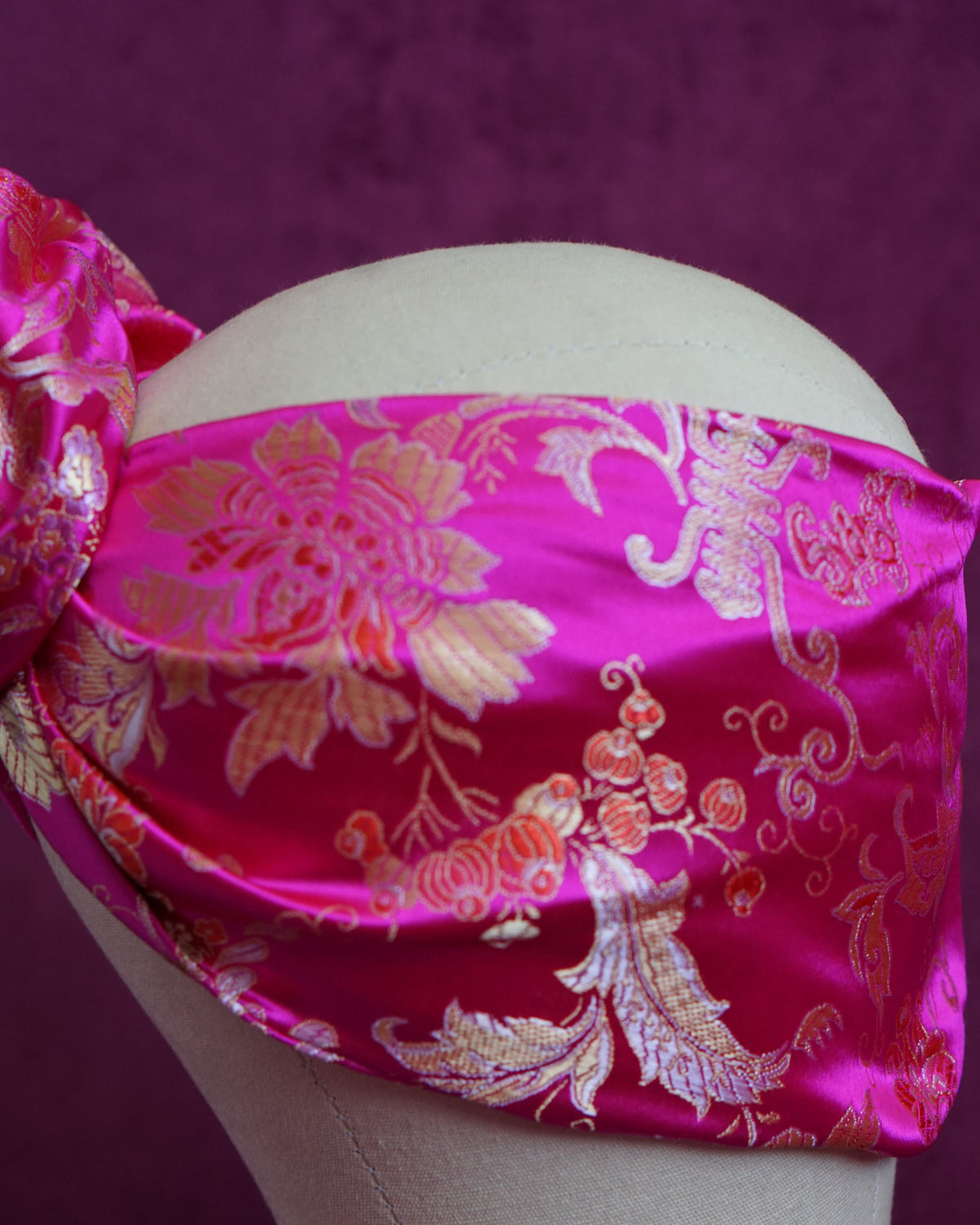 Handmade wired turban headband in fuchsia and gold satin brocade woven with lush blooms