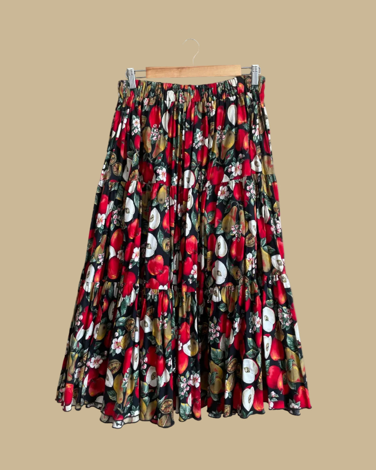 Vintage handmade tiered maxi skirt with an apple, pear, and blossom print on a black ground
