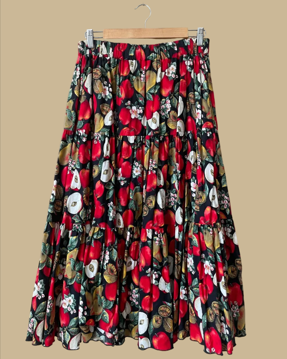 Vintage handmade tiered maxi skirt with an apple, pear, and blossom print on a black ground