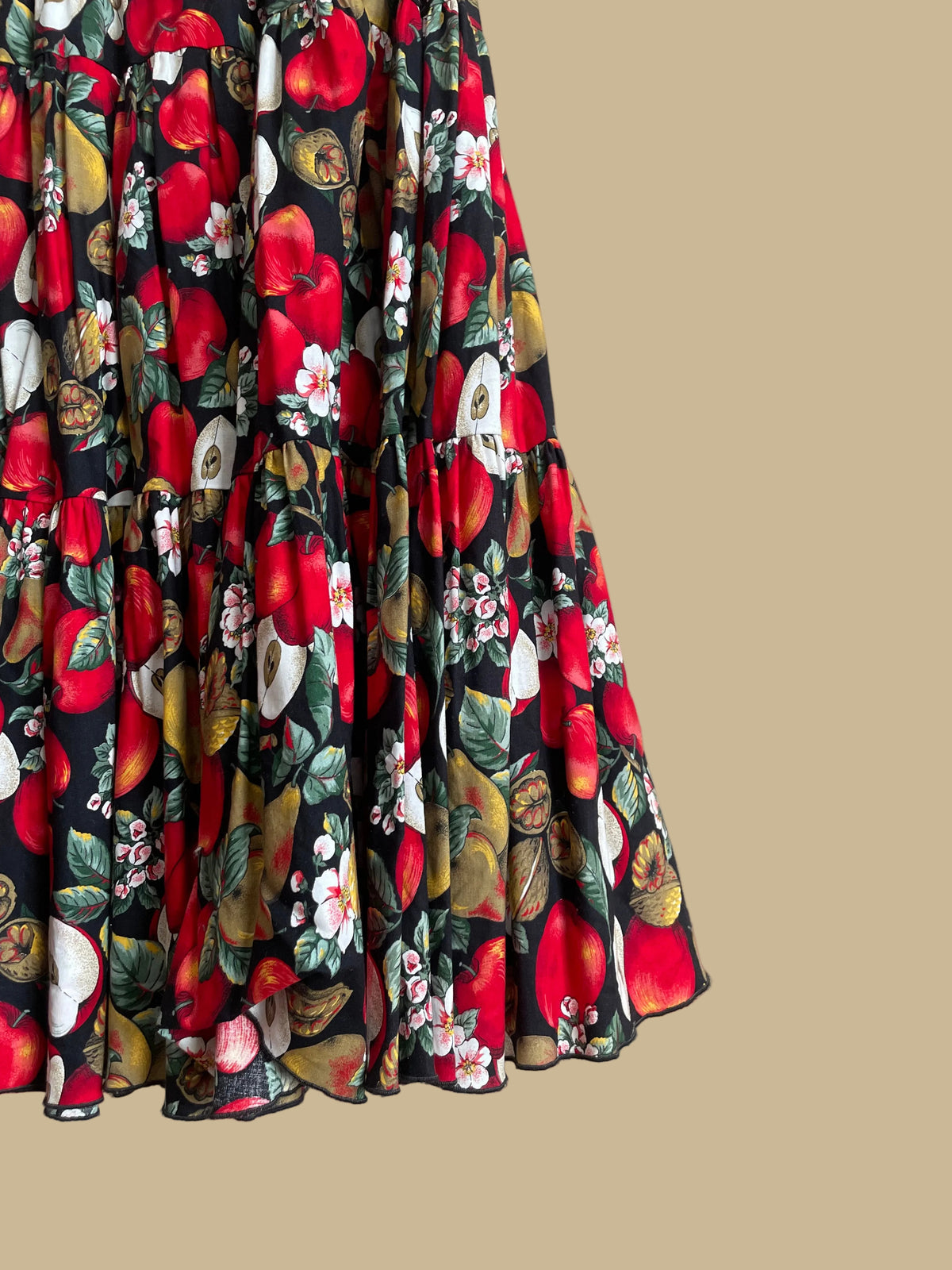 Vintage handmade tiered maxi skirt with an apple, pear, and blossom print on a black ground