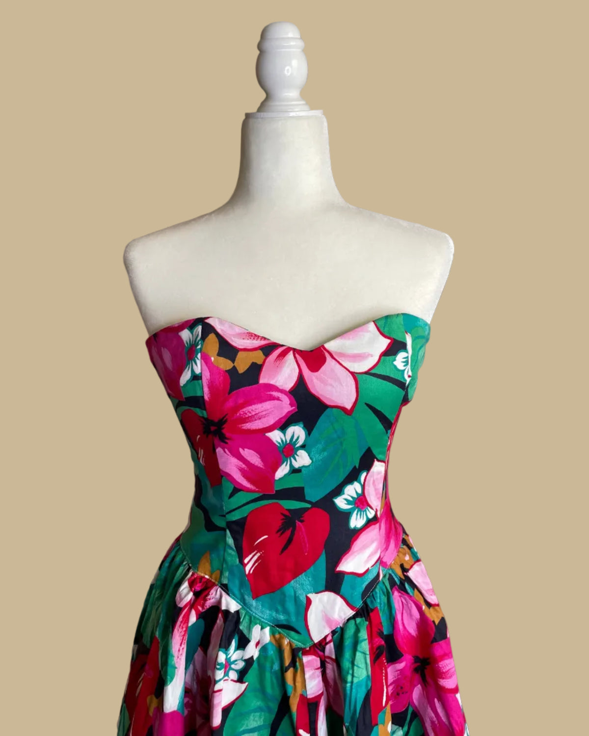 Close-up of the sweetheart bodice on the tropical floral strapless dress