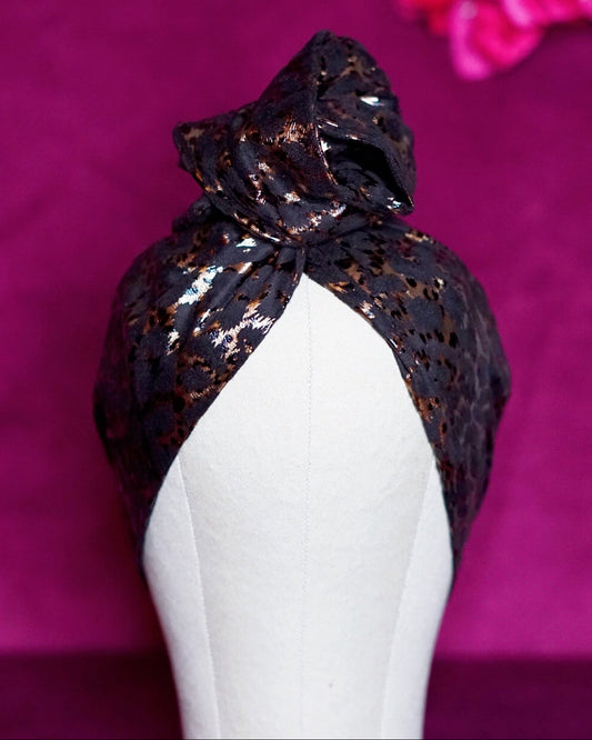 Metallic leopard print wired turban headband by Lillian & Joan