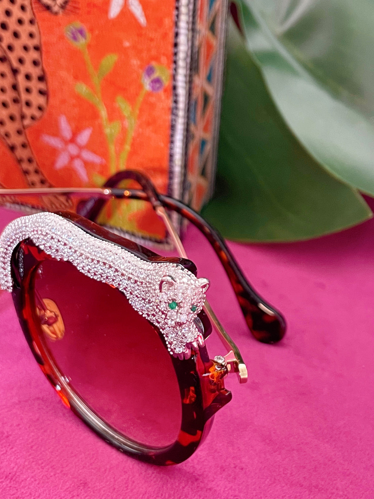 Fierce Feline Tortoise Brown sunglasses shown with the custom L&J metallic pouch