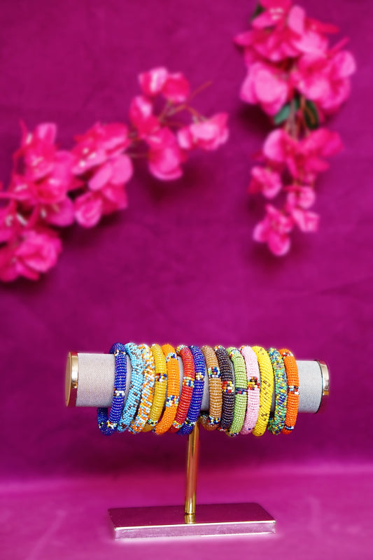 Collection of handmade colorful beaded maassai bracelets from Kenya 