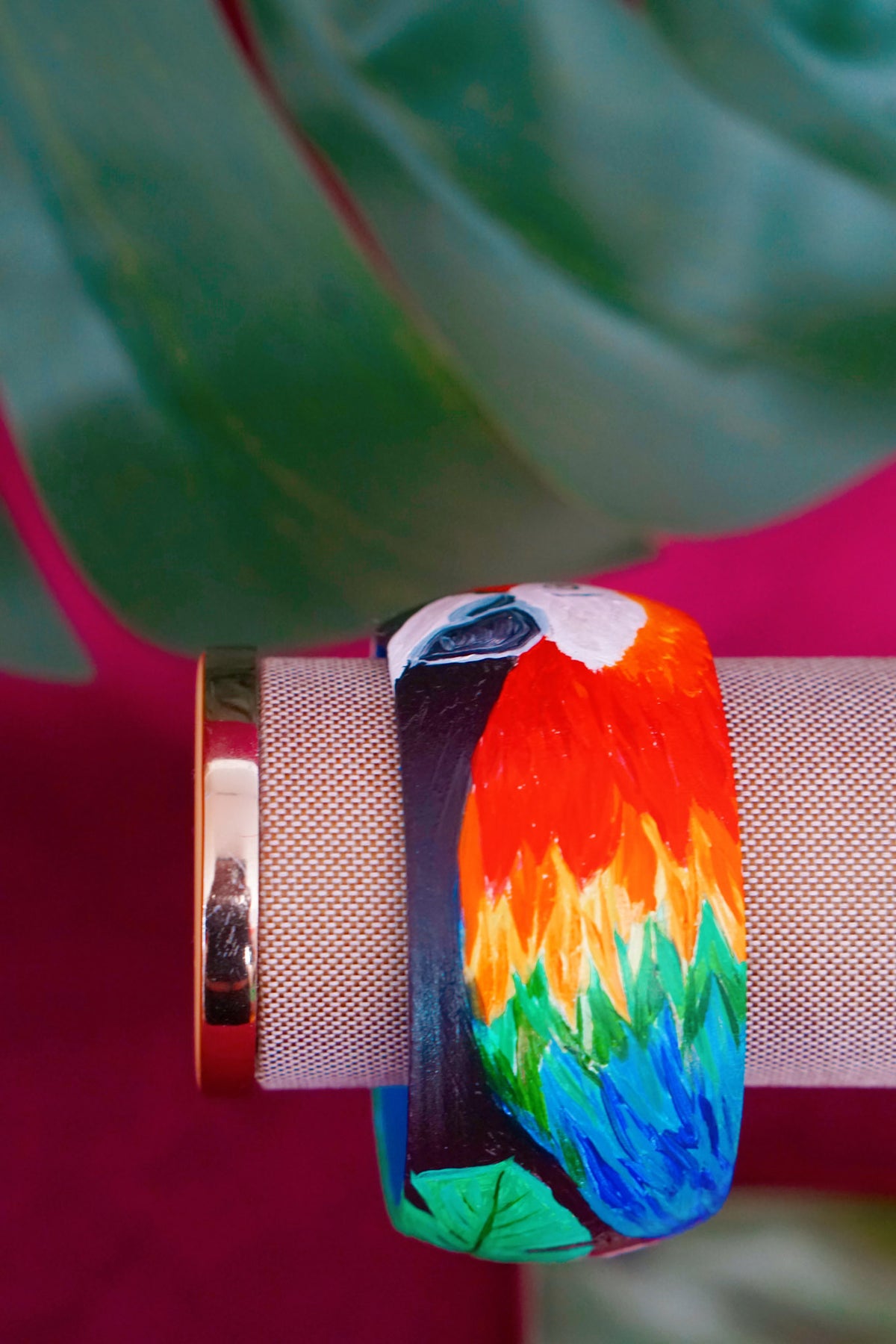 Tropical art bangle with scarlet macaw design by Lillian & Joan