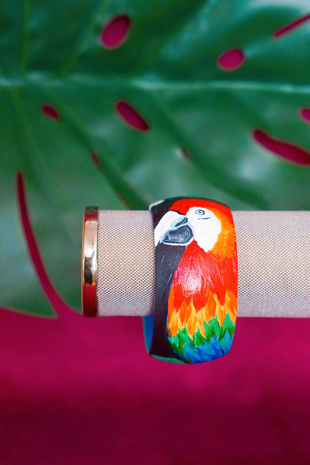 Tropical art bangle with scarlet macaw design by Lillian & Joan