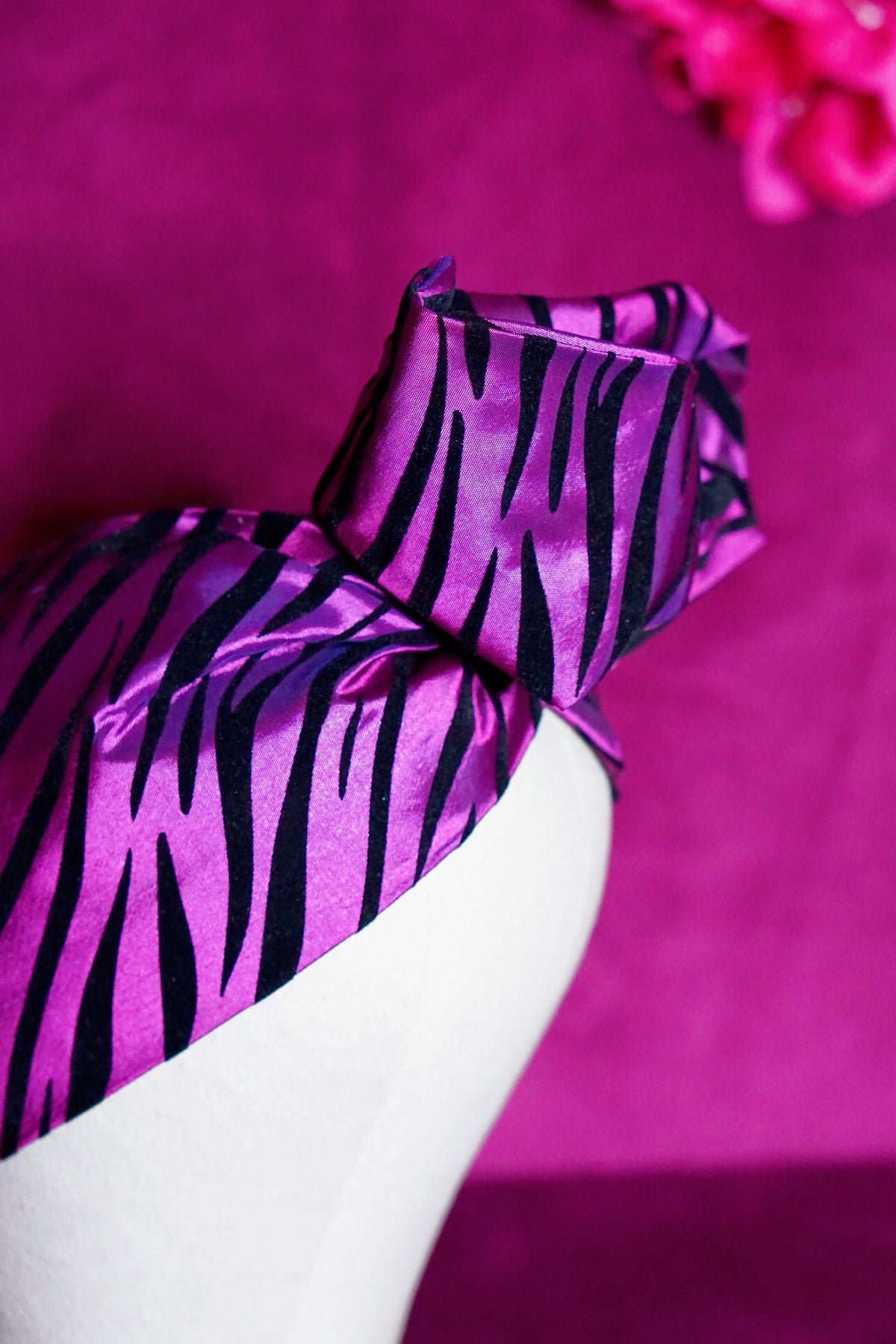 Metallic purple zebra print wired turban headband by Lillian & Joan