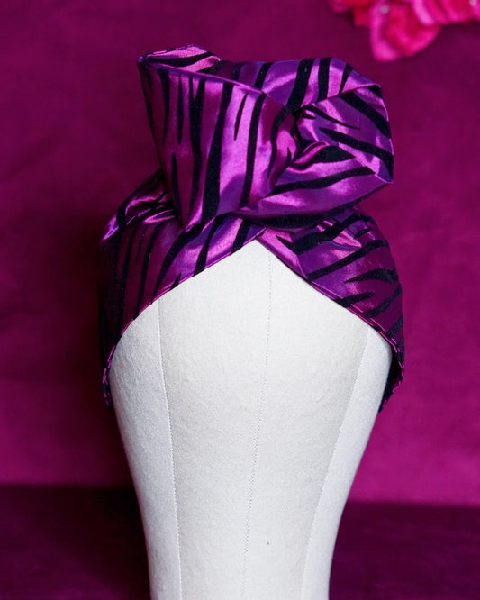 Metallic purple zebra print wired turban headband by Lillian & Joan