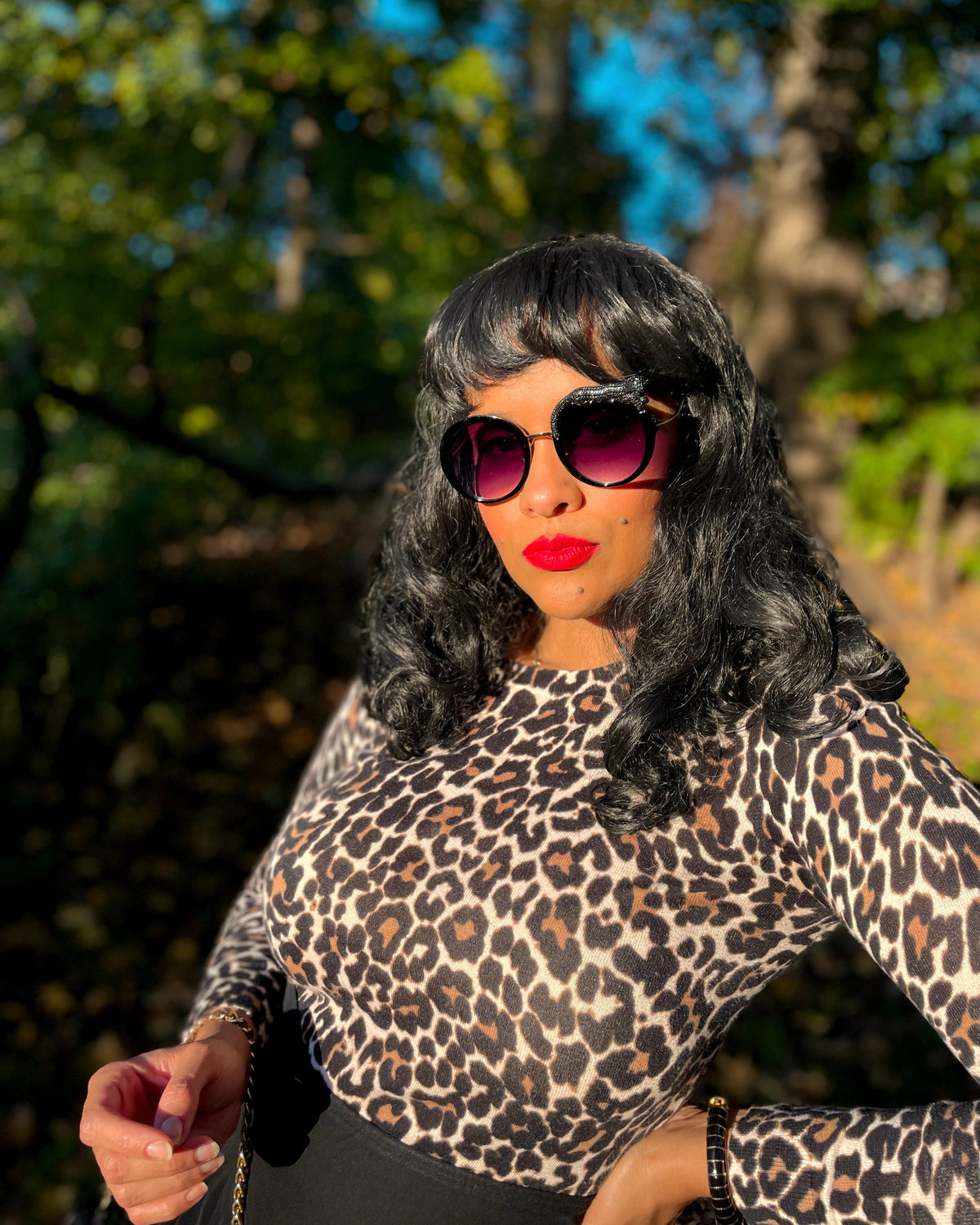 Fierce Feline Onyx Black sunglasses shown with the custom L&J metallic pouch